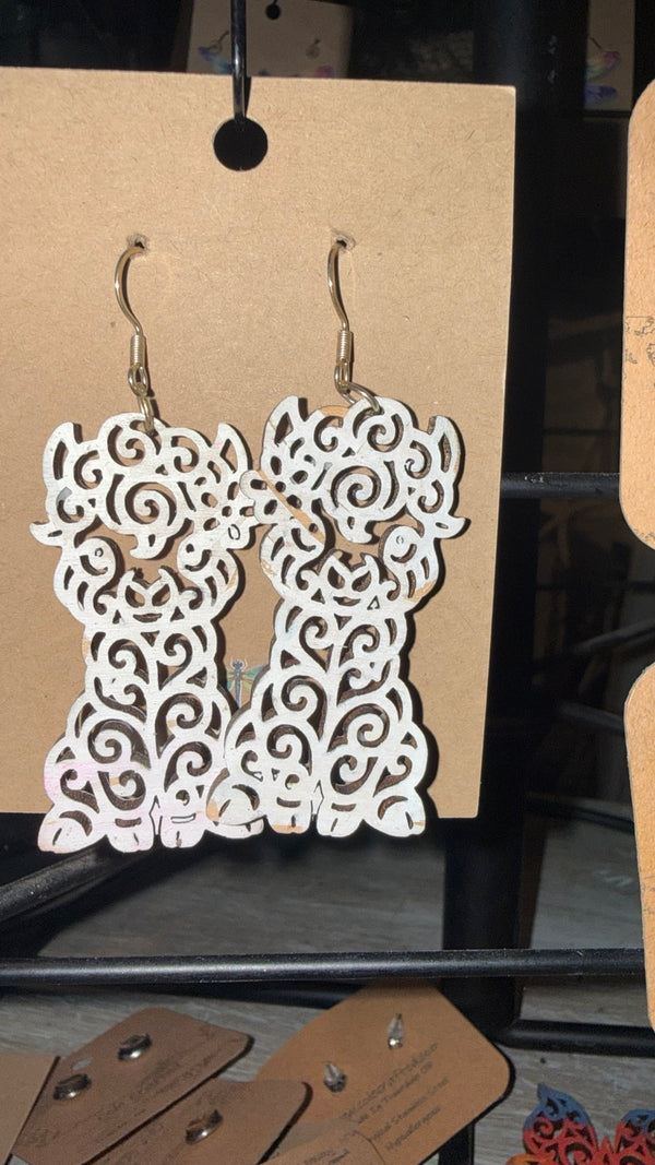 White Llama Filigree Earrings — original photograph