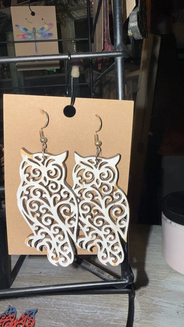 White Filigree Owl Earrings — original photograph