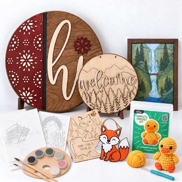 ChicaTiza wood craft kits, Casa Araceli art scene kit, and a Bucilla crochet kit arranged together.