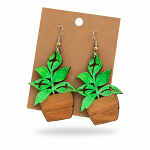 Arrowhead Plant Earrings displayed on a kraft earring card