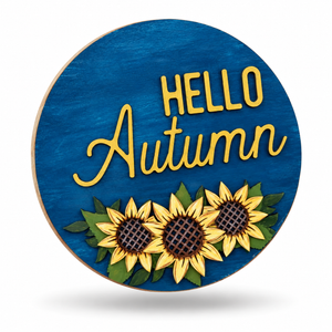 Hello Autumn round ChicaTiza craft sign with sunflowers, shown hovering on a white background