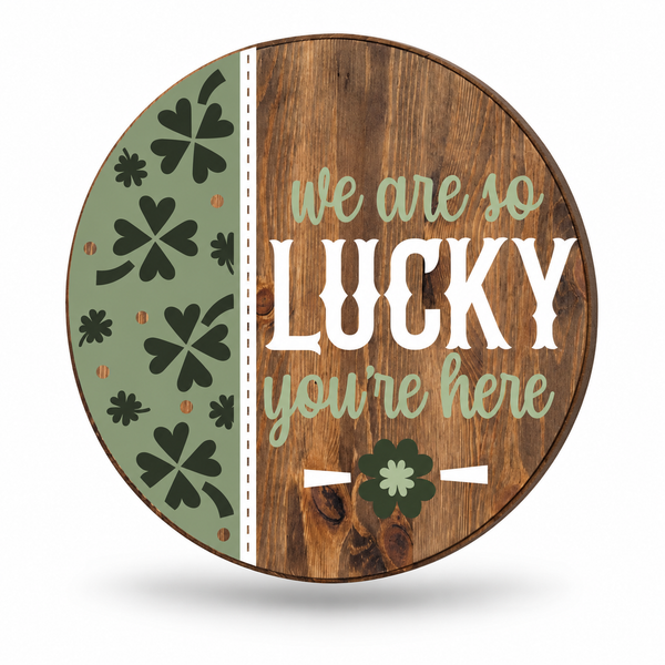 We Are So Lucky You’re Here Craft Kit by ChicaTiza — round wooden design on a white background with a soft shadow