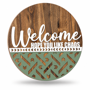 Welcome—We Hope You Like Chaos Craft Kit by ChicaTiza — round wooden design on a white background with a soft shadow