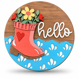 Rain Boots Hello Craft Kit by ChicaTiza — round wooden design on a white background with a soft shadow
