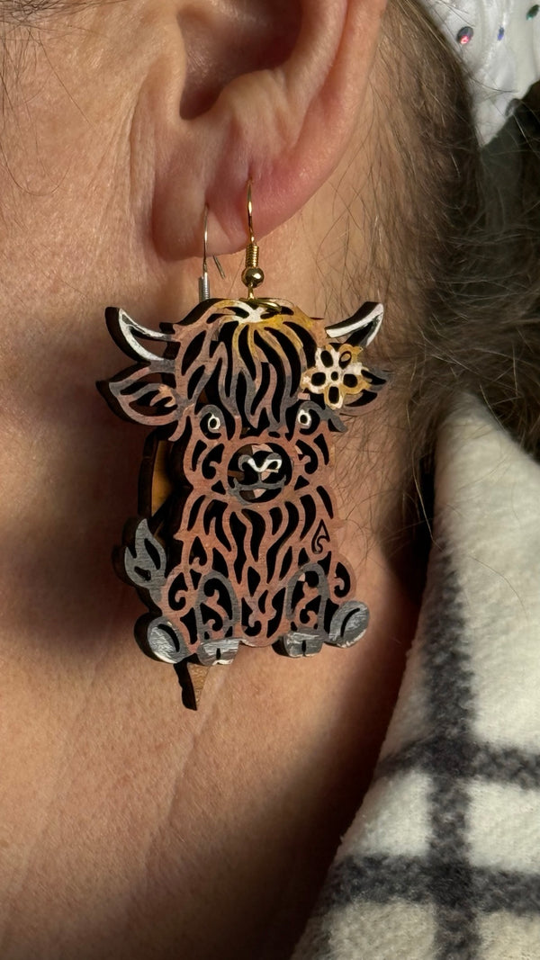 Hand-painted Highland Cow Filigree Earrings by Wisp & Fern — detail view