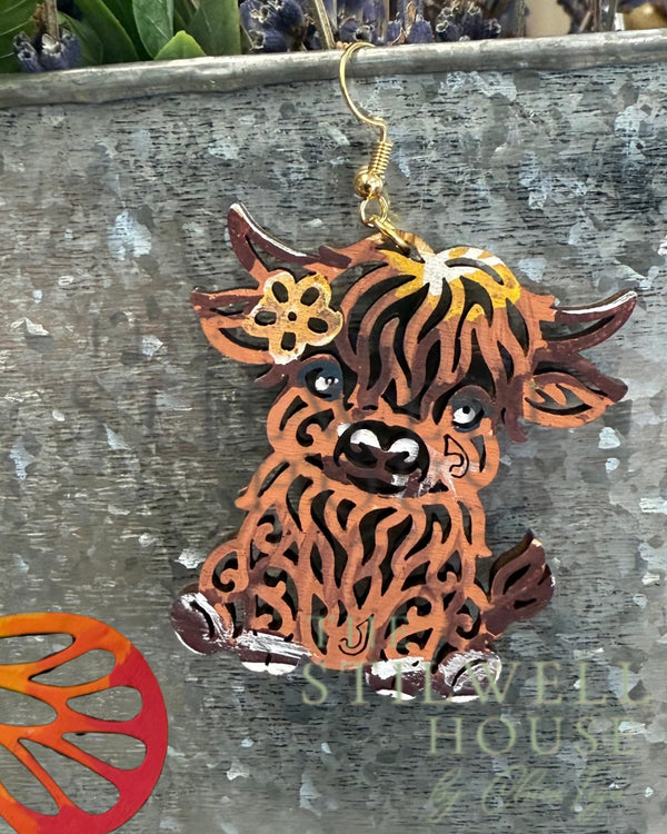 Hand-painted Highland Cow Filigree Earrings by Wisp & Fern — front view