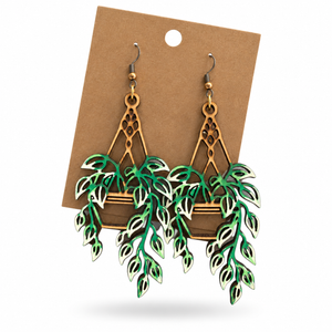 Pothos Hanging Plant Earrings displayed on a kraft earring card