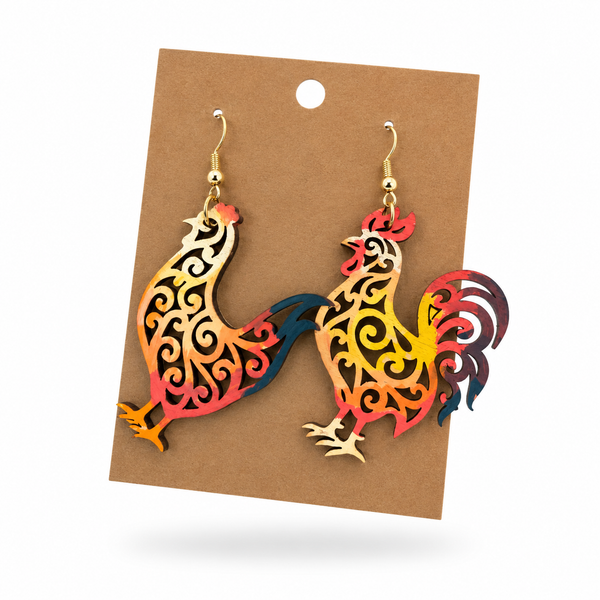 Rooster and Hen Filigree Earrings displayed on a kraft earring card