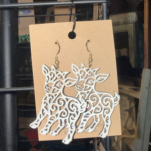 Hand-painted white filigree goat earrings by Wisp & Fern