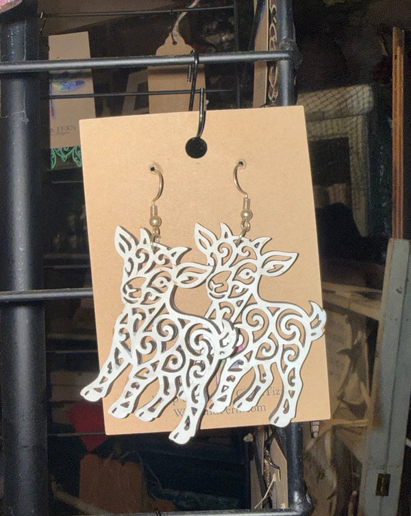 Hand-painted white filigree goat earrings by Wisp & Fern