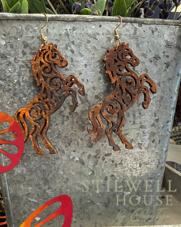 Rearing Rusty Iron Horse Filigree Earrings — original photograph