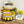 A wooden tiered tray decoration kit with sunflower themes, including cutouts for a truck, sunflowers, and text phrases, arranged on a wooden surface.